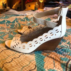 White wedge heel l laser cut fine leather upper